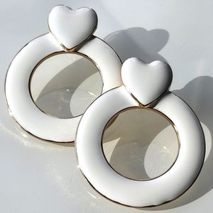 Earrings by Sugarfix enamel heart. For pierced ears. Gold and white.